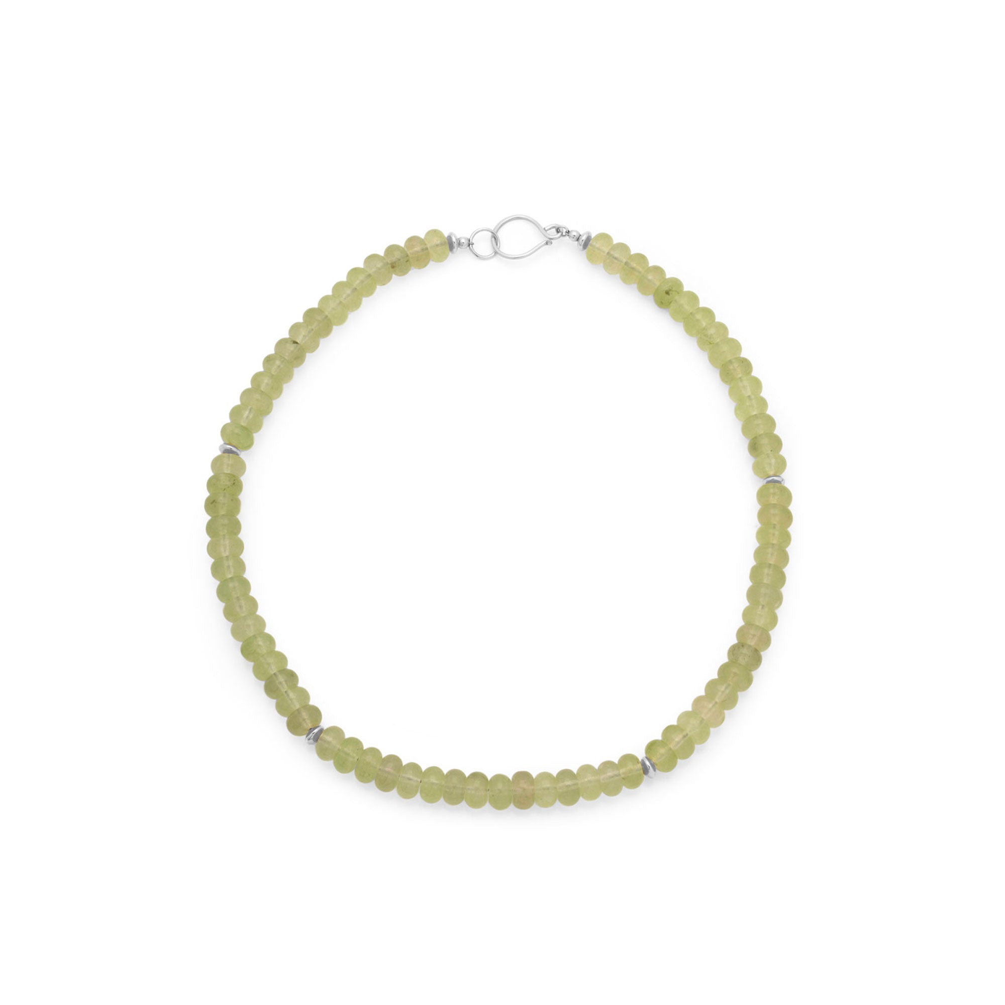 A beaded necklace made of small, faceted light olive-green beads with a silver-tone clasp, displayed on a clean white background.